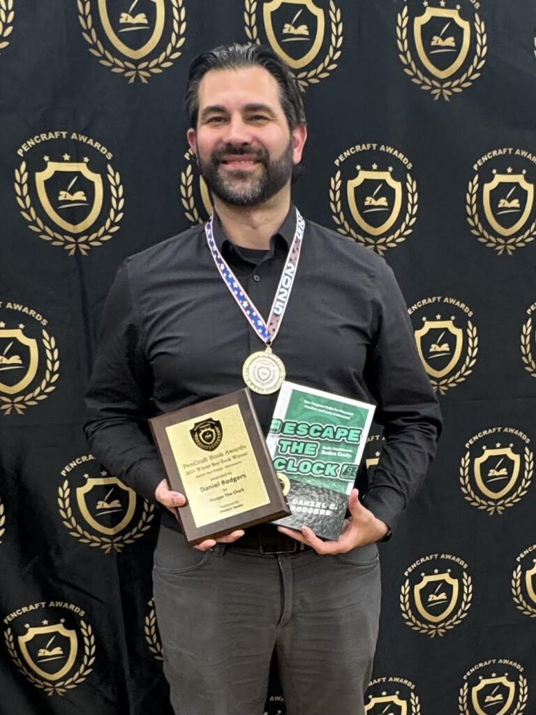 The author accepting the PenCraft best book award.